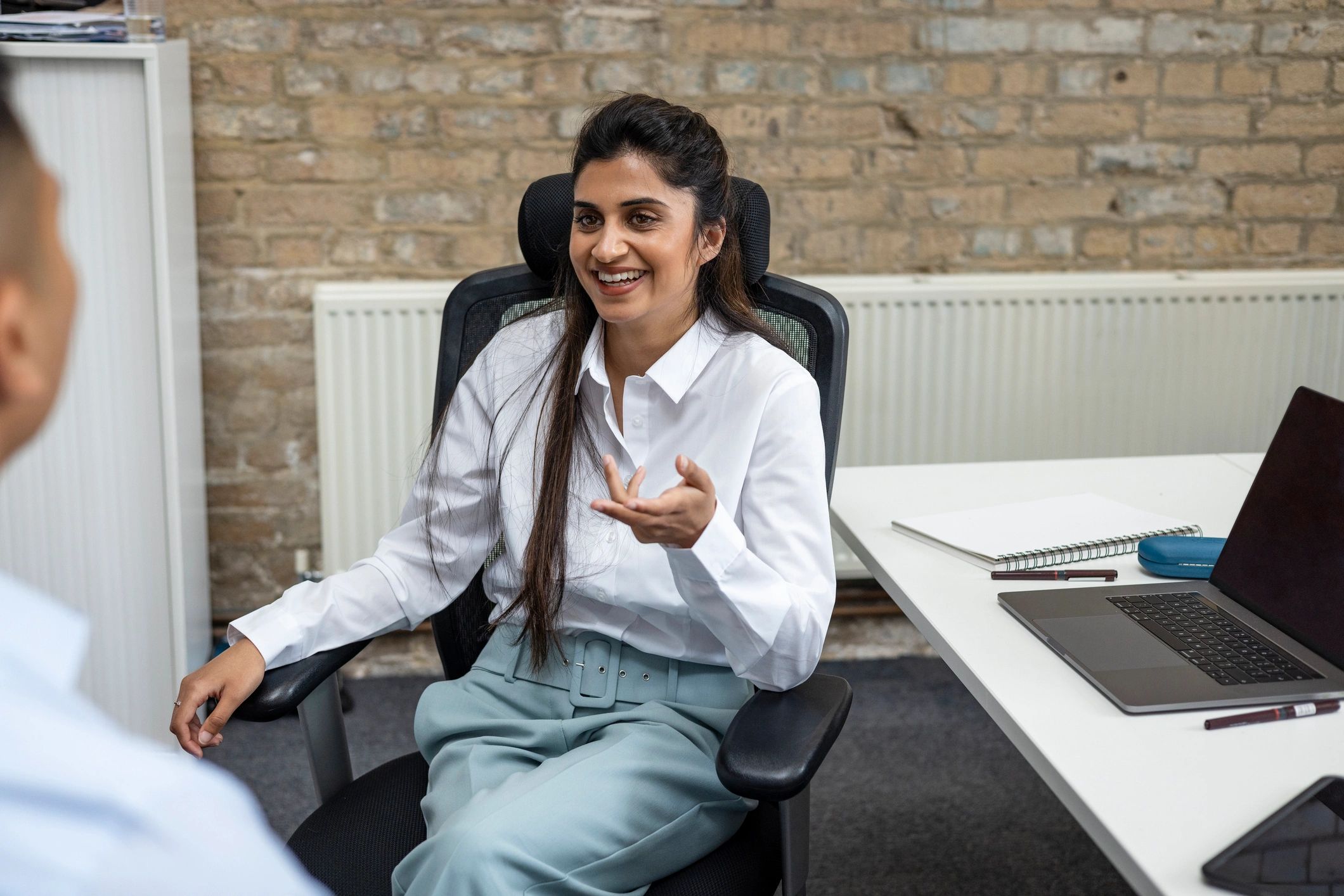 Legal team meeting with a client in a professional office